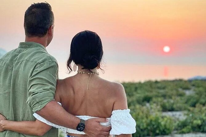 Santorini Private Wine Tour at Sunset with Tastings and Pictures - Santo Wines and the sunset bottle moment
