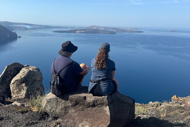 Santorini's Famous Fira to Oia Hike: A Private tour Adventure - Arriving in Oia: white walls, narrow lanes, and sunset footing