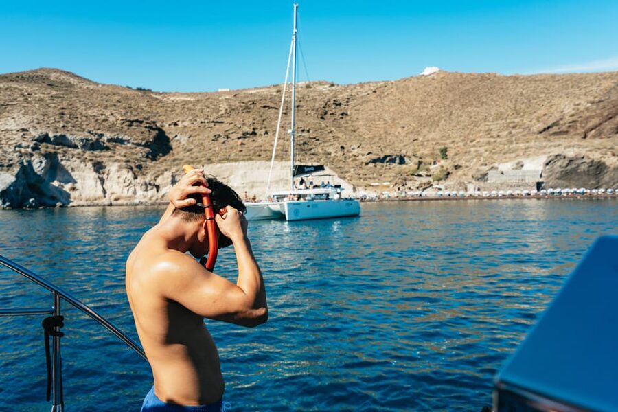 Santorini: Sailing Catamaran Cruise with BBQ and Drinks - Crew and Guide Energy: Friendly Service With Real Structure