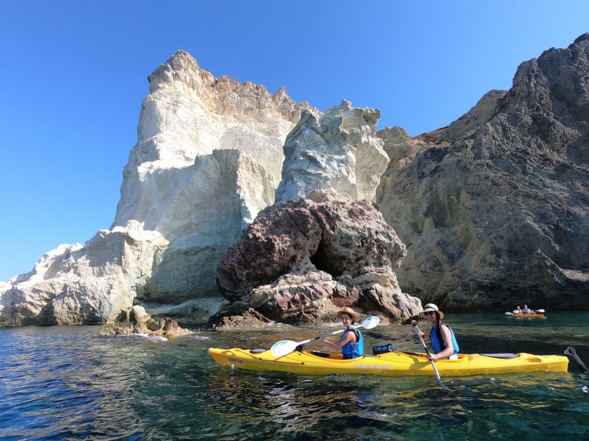 Santorini: Sea Caves Kayak Trip with Snorkeling and Picnic - White Beach cliff jumping: controlled adrenaline at the right moment