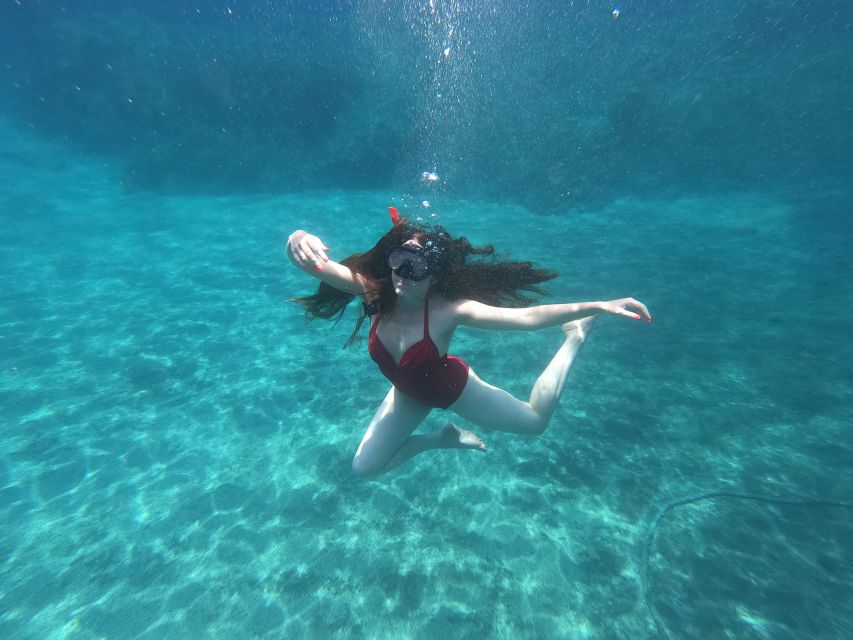 Santorini: Sea Caves Kayak Trip with Snorkeling and Picnic - Paddling Santorini’s south coast and Akrotiri’s little cave world