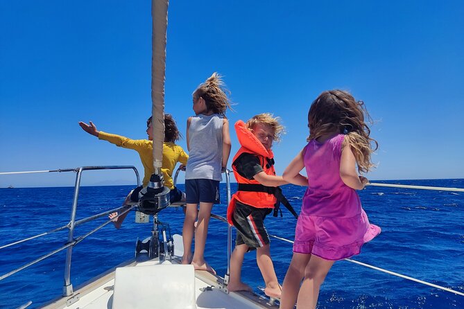 Santorini Semi-private Morning or Sunset Volcano Sailing Tour - Red Beach and White Beach: fast stops that still pay off