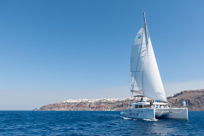 Santorini Small-Group Catamaran Sailing Trip(BBQ,drinks, transfer) - What’s included: towels, drinks, snorkel gear, and small comforts