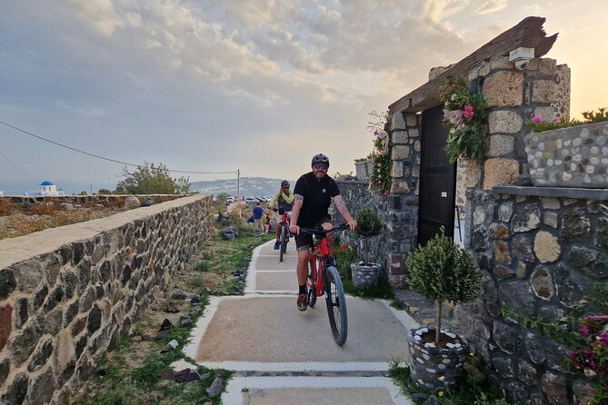 Santorini Small Group Guided E-bike Tour & Local Tomato Museum - Stop 4: Vineyards and the basket-pruning technique