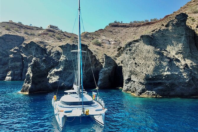 Santorini: Standard Small-Group Catamaran Cruise with Food/Drinks - Crew, comfort, and safety rules that shape the mood