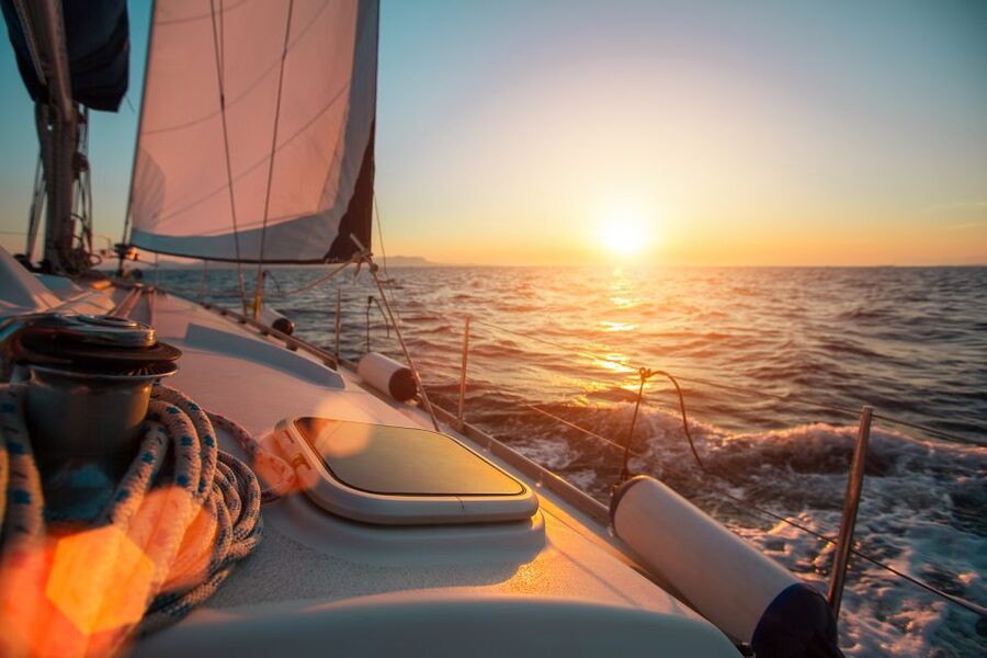 Santorini: Sunset Caldera Cruise with BBQ Meal and Drinks - Vlihada Marina to Akrotiri: the coast before the main drama