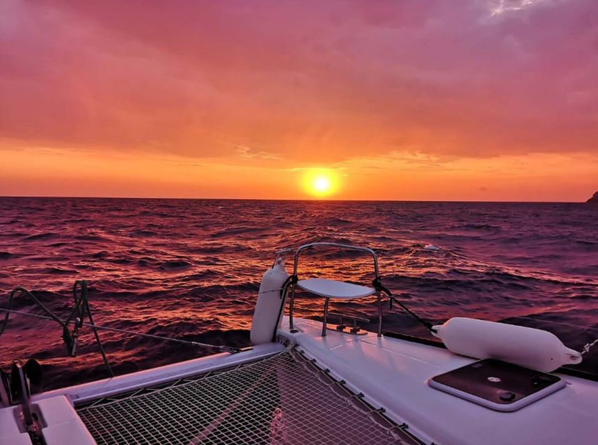 Santorini: Sunset Cruise with Greek Dinner and Transfer - Nea Kameni and Palea Kameni: volcanic water and snorkel-ready stops