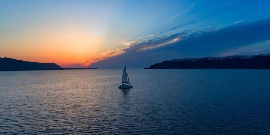 Santorini: Sunset Cruise with Swim Stops, Dinner, and Drinks - Hot Springs Swim Stop: volcanic water and the practical reality