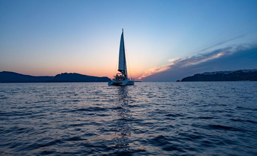 Santorini: Sunset Cruise with Swim Stops, Dinner, and Drinks - Dinner on board: Greek mezzes, BBQ, and vegetarian choices