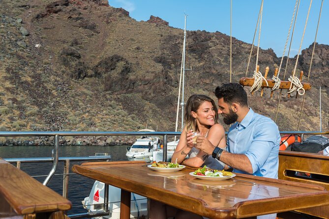 Santorini Sunset Dinner Cruise Including Nea Kameni Visit - Nea Kameni volcano: steep climb, best viewed from boots-on-ground