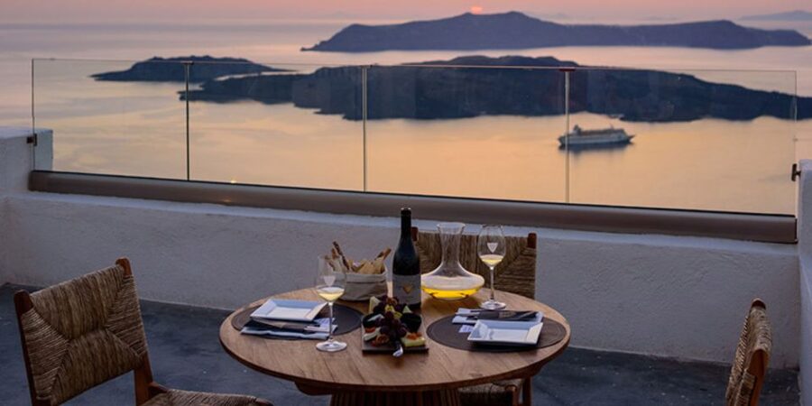Santorini: Sunset Guided Tour with Hotel Pickup - Three Bells of Fira: postcard views and guided picture help