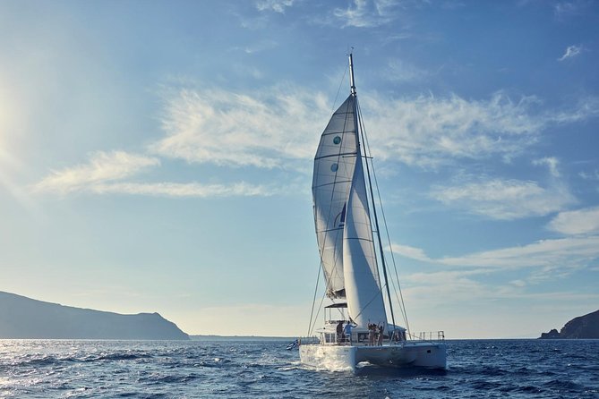 Santorini Sunset Luxury Sailing Catamaran Cruise with BBQ, drinks, transfer - Hot springs soak: warmer water up to 4° and a real sulfur warning