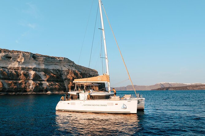 Santorini Sunset Sailing Cruise: Dinner, BBQ, Open Bar, Transfers - Red Beach: photos first, then swim time