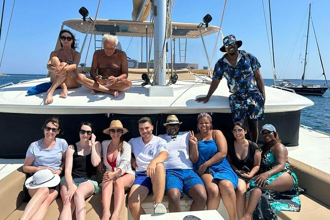 Santorini Sunset Sailing Cruise: Dinner, BBQ, Open Bar, Transfers - Mesa Pigadia Beach: swimming, snorkel time, and your Greek dinner