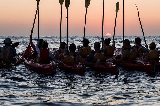 Santorini: Sunset Sea Kayak with Light Dinner with Pick-up Option - The snorkeling break: crystal water, included gear, real value
