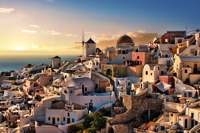 Santorini Sunset Walking Tour inc. tastings and 5 drinks - Three Bells of Fira: seafood classics, craft beer, and photo moments