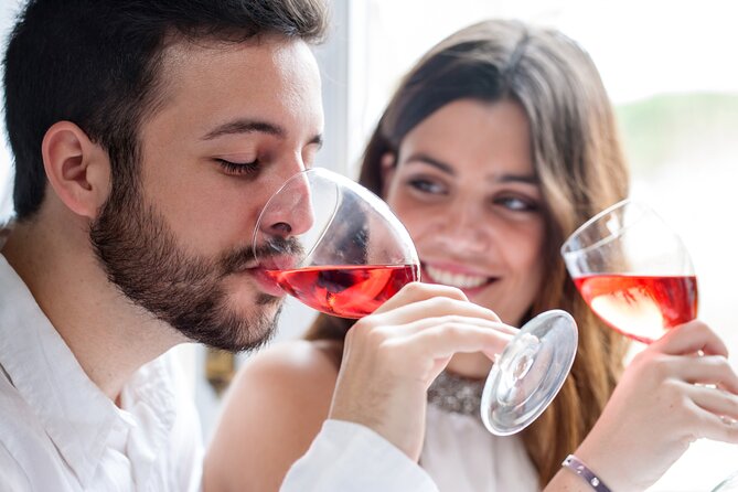 Santorini Sunset Walking Tour inc. tastings and 5 drinks - Firostefani caldera-edge tastings: liqueur plus a sweet