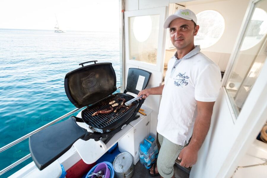 Santorini: Traditional Fishing Trip and Fresh Fish Lunch - Anchoring Near Red, White, and Black Beaches for Prime Fishing Water