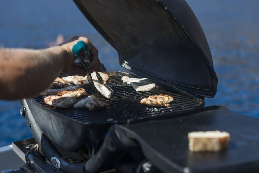 Santorini: Traditional Wooden Boat Tour with Meal and Wine - Key highlights worth circling