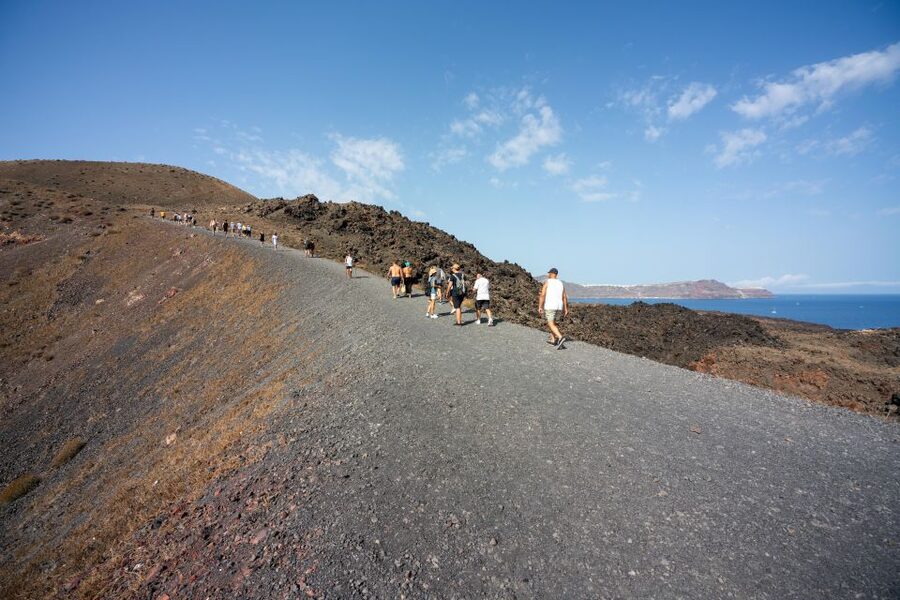 Santorini: Volcanic Islands Cruise with Hot Springs Visit - What to pack and how to handle the walking and water
