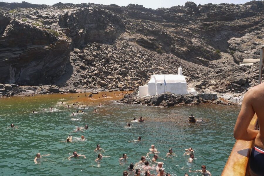 Santorini: Volcanic Sunset Cruise with Dinner - Traditional caique sunset views off Santorini’s volcano side