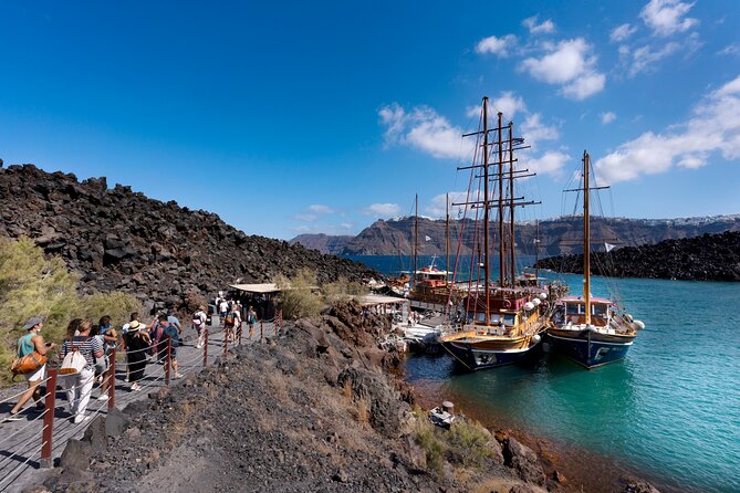 Santorini - Volcano and Hot springs Boat Trip with Bus Transfer - Getting There: Fira Old Port, the Pickup, and When to Arrive