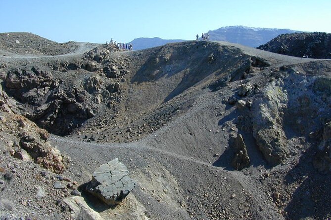 Santorini - Volcano and Hot springs Boat Trip with Bus Transfer - The Volcano Stop at Erinia: What You Do in 1h 15m
