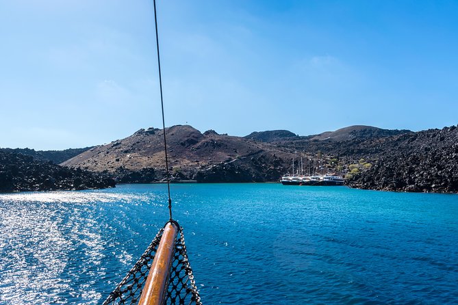 Santorini Volcano and Hot Springs Cruise Tour from Fira Old Port - Volcano Fees and Cable Car: The Decision You Should Make Ahead