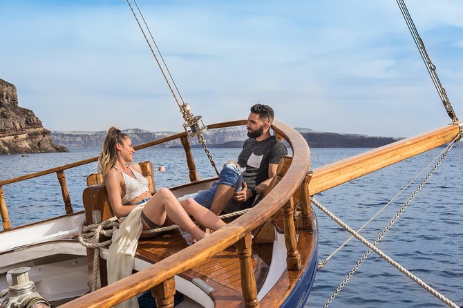 Santorini Volcano and Hot Springs Cruise Tour from Fira Old Port - Palea Kameni Hot Springs: Swim for the Thermal Water
