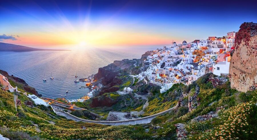 Santorini: Volcano and Hot Springs Sunset Dinner Cruise - Sunset sail back: romantic views, party energy, and a cold-deck reality check