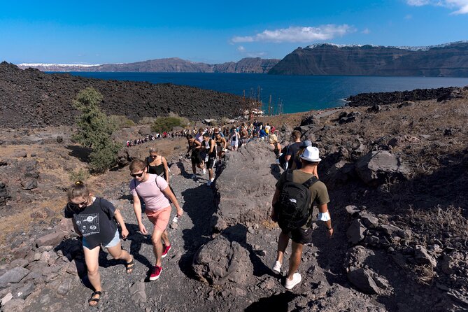 Santorini Volcano Hot Springs - Stop 1: Climbing toward the volcano craters (and paying the small entry fee)
