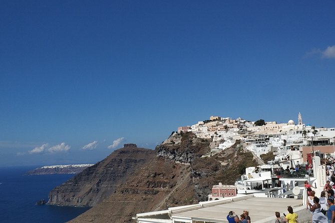Santorini: Walking Tour of Fira - Stop inside Saint John the Baptist: the pink bell and Catholic monastery feel