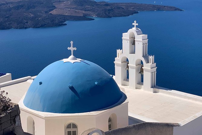 Santorini: Walking Tour of Fira - Orthodox Metropolitan Cathedral: the big white landmark over the caldera