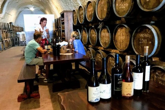 Santorini Wine and Food Experience with pick up included - Pickup by Mercedes--Benz minivan: the hidden value