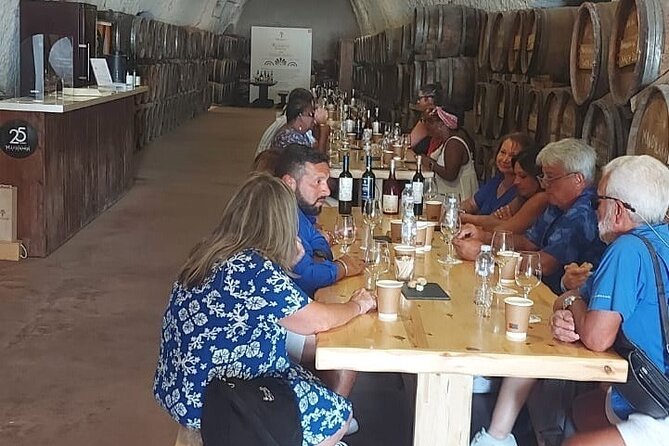 Santorini Wine Tour with sunset in Oia - Stop 2: The Wine Museum Koutsogiannopoulos—an underground cave made by 21 years