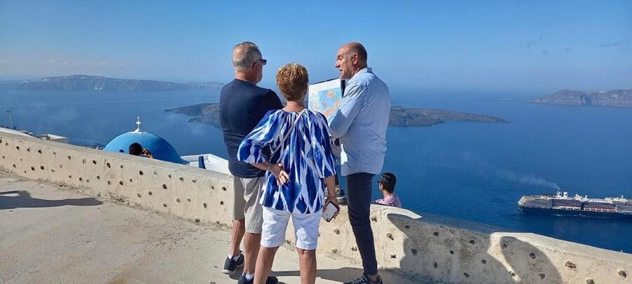 Santorini without Barriers: Accessible 5-Hour Private Tour - Entering Santorini via Firostefani’s blue-domed photo start