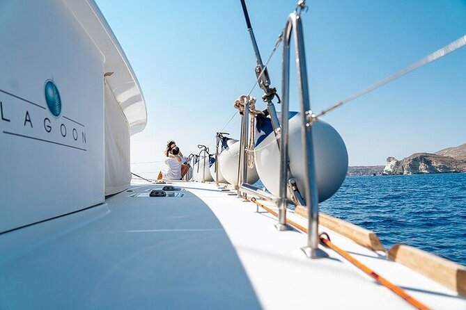 Semi Private Santorini Catamaran Tour - Stop 2: Red Beach for the volcanic color show