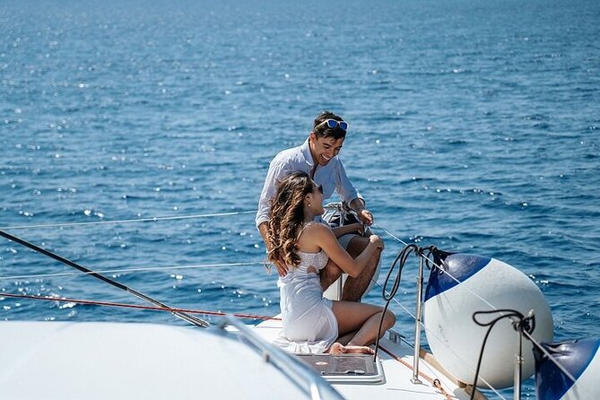 Semi Private Santorini Catamaran Tour - Stop 3: Nea Kameni snorkeling and swimming with real time