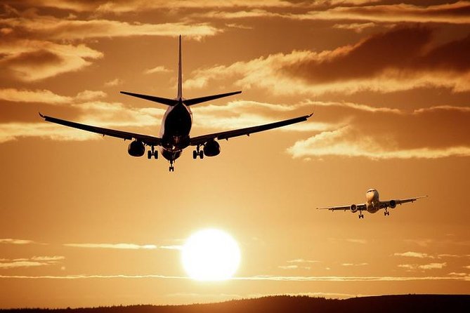 Shared Arrival Transfer: Santorini Airport to Hotel or Cruise Port - Cruise Passenger Approach: Ship Timing Matters