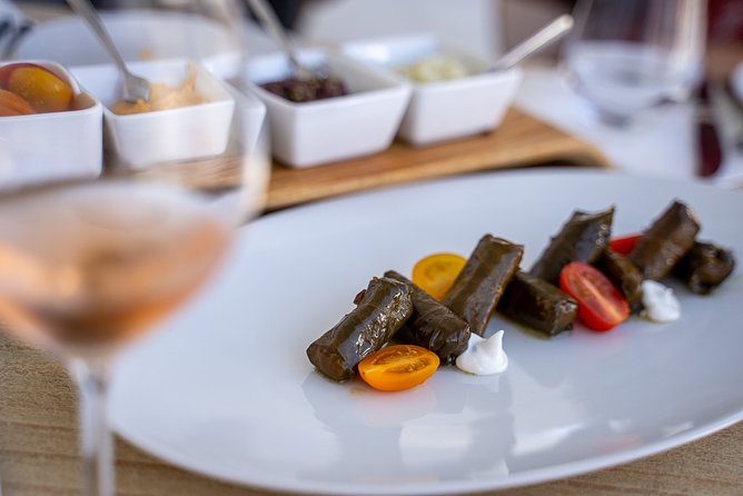 Small-Group Greek Food and Wine Tasting Tour in Santorini - The Meze Dinner: Traditional Food, Local Wine, No Shortcuts