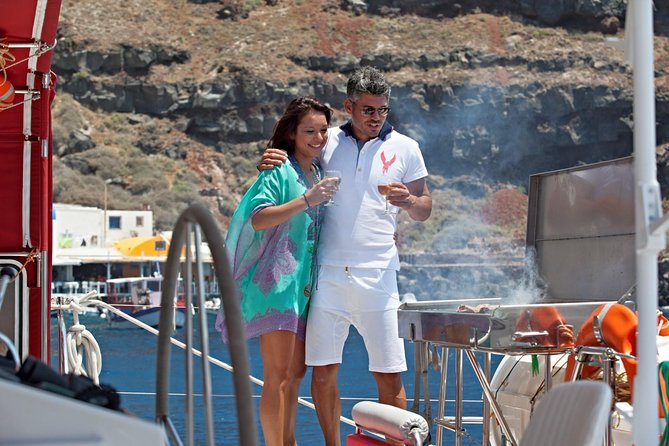 Sunset Sailing Catamaran Cruise in Santorini with BBQ and Drinks - Hotel Pickup, Port Timing, and the 5-Hour Flow