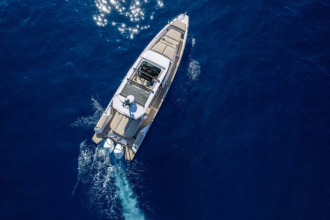 The Fastest Private Motor Yacht in Santorini - All Inclusive Tour - Red Beach: color, cliffs, and a quick swim-and-snorkel moment