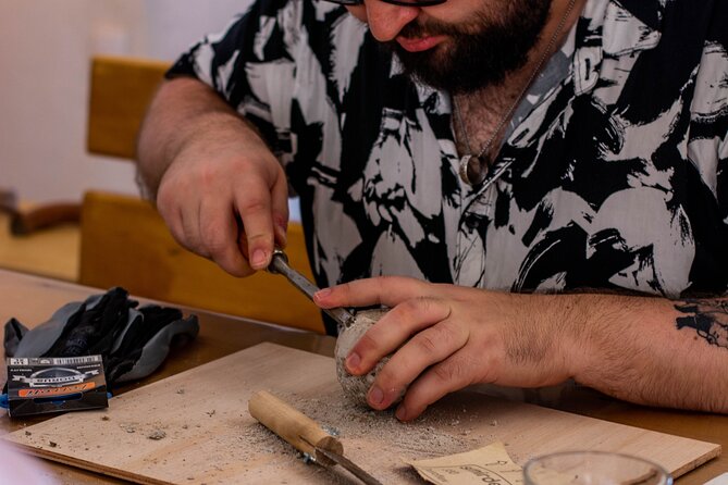 Wine tasting and Carving lesson in Santorini - Volcanic pumice carving with Nicholas Katris (yes, beginners fit)